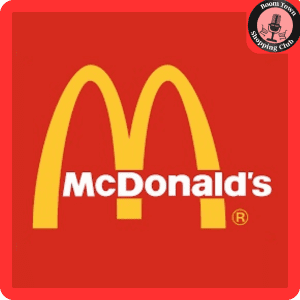 The image shows the McDonald's $8 Gift Card* with the iconic yellow arches on a red background. In the top right corner, there is a small circular logo with text that appears to be “Boom Town Shopping Club” surrounding an illustration of two shopping bags.