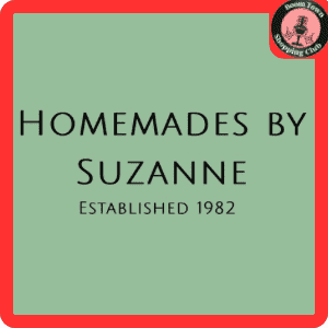 A logo for "Homemades by Suzanne-Downtown $10 Gift Certificate" with "Established 1982" written below the name on a light green background. The logo is bordered in red, and the upper right corner features a smaller logo for the "Historic Town Shopping Center.